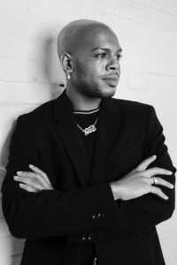 A black and white photo of a man looking away